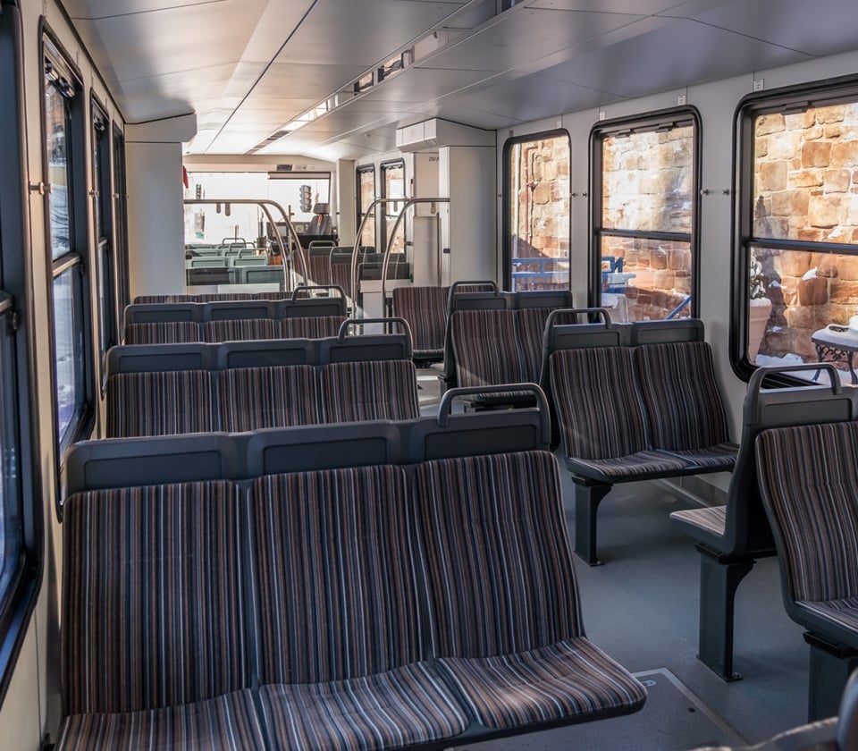 Interior of empty train with seats