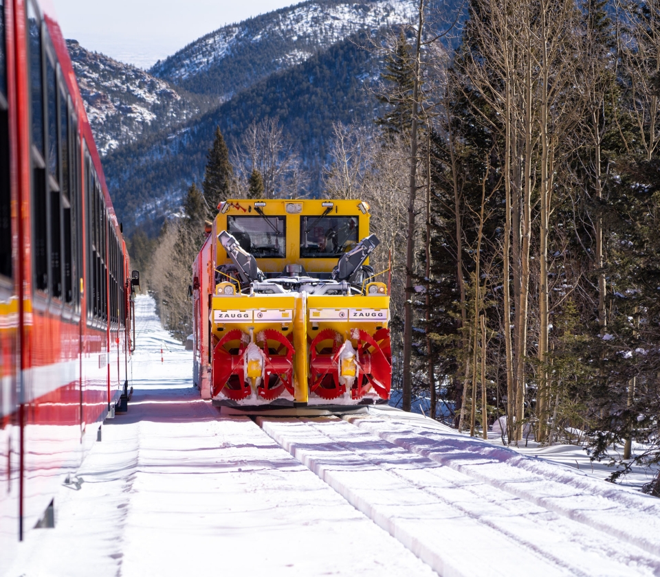 Red train on tracks with snow 3