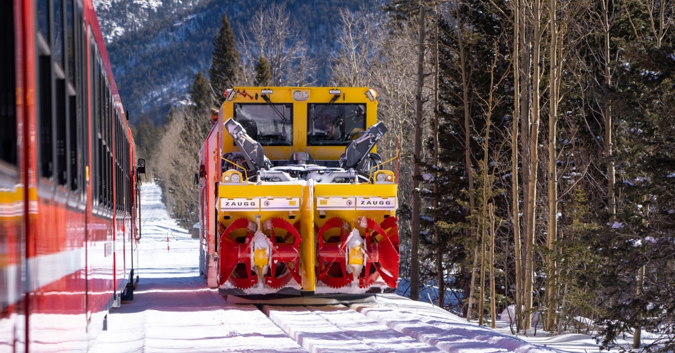 Red train on tracks with snow 3