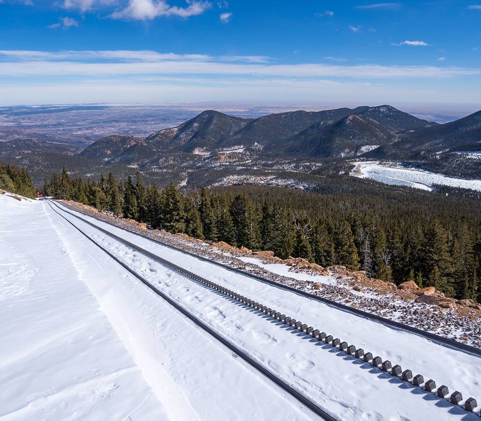 Train Tracks On A Snowy Mountain