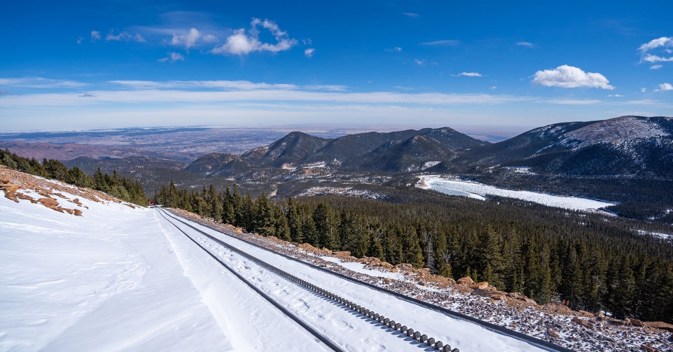 Train Tracks On A Snowy Mountain